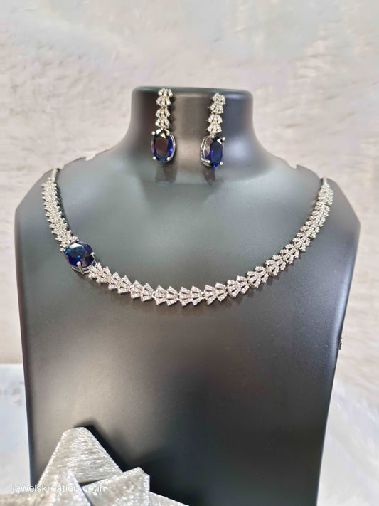 rhodium-blue-stone-side-pattern-necklace-set-jewelskreation